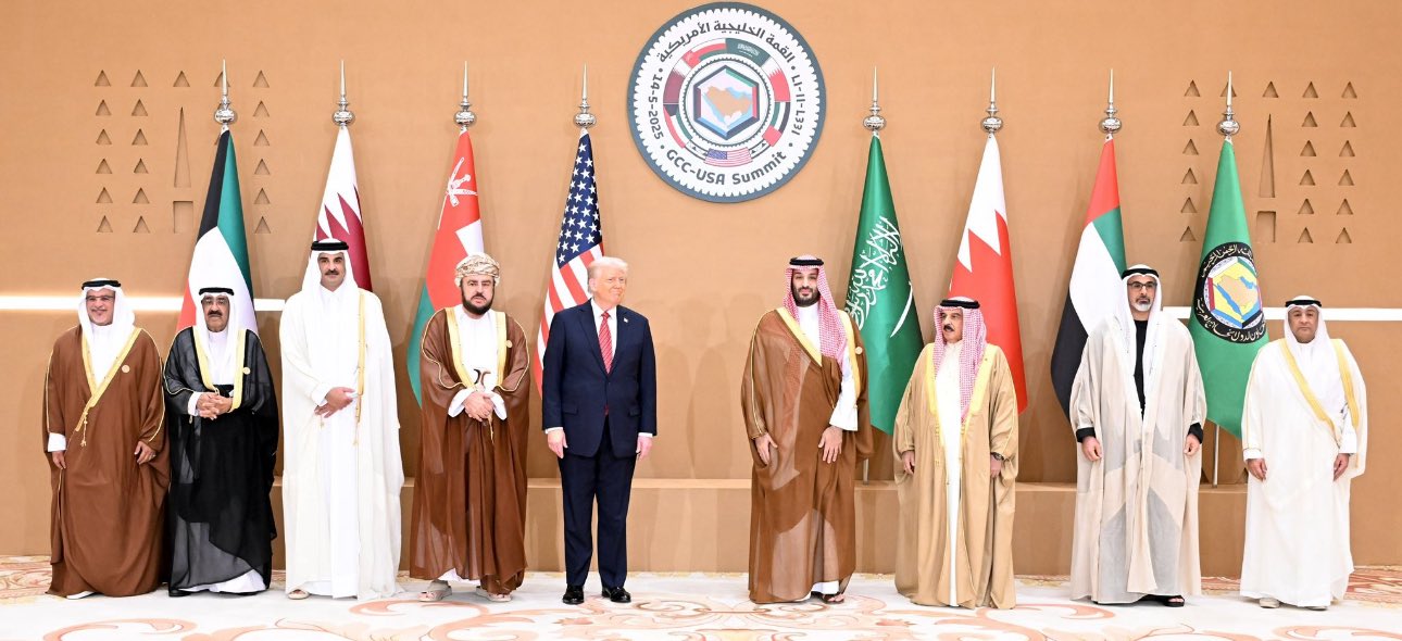Leaders pose for a group photo at the GCC-USA Summit, featuring Donald Trump and Gulf Arab dignitaries standing in front of their national flags and the official summit logo.